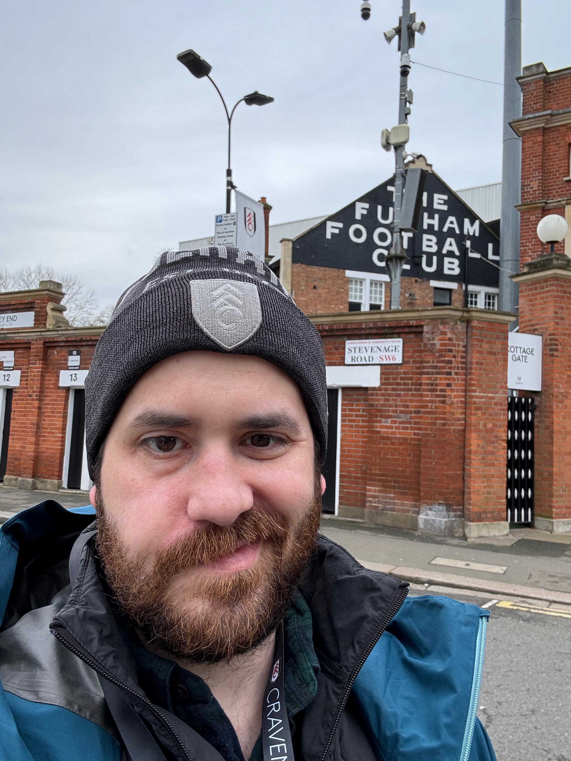Fulham Boston supporter outside Craven Cottage